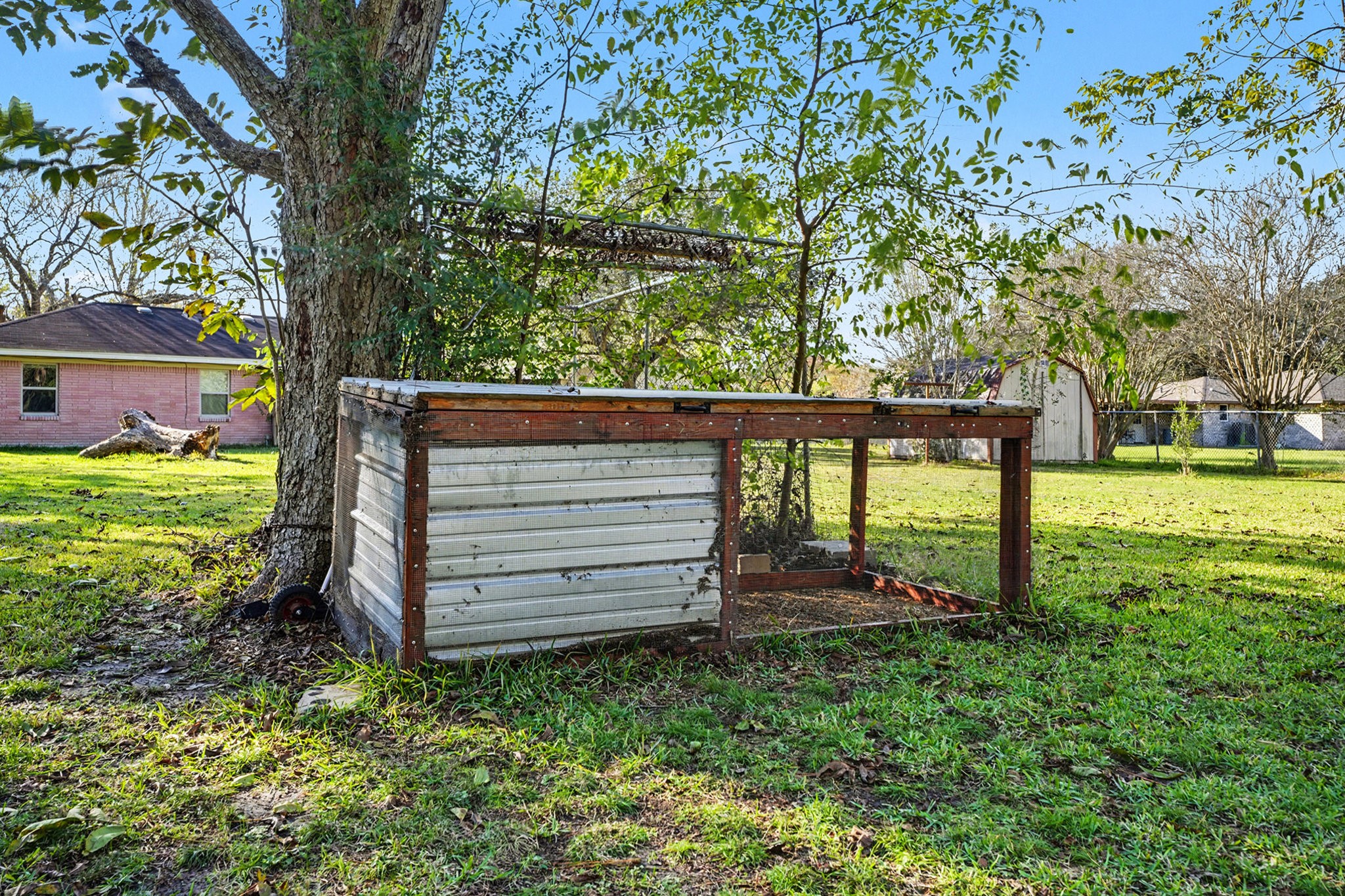 4802 Crosby Cedar Bayou Road Baytown, TX 77521 - Photo 25 of 28 a view of a backyard with a garden