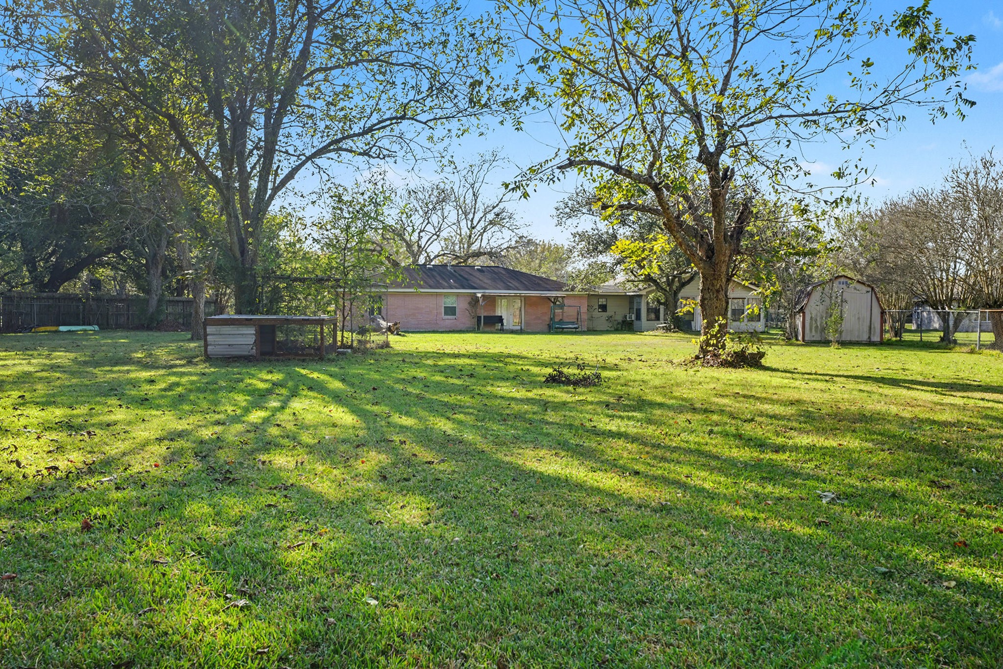 4802 Crosby Cedar Bayou Road Baytown, TX 77521 - Photo 26 of 28 a view of a house with a big yard