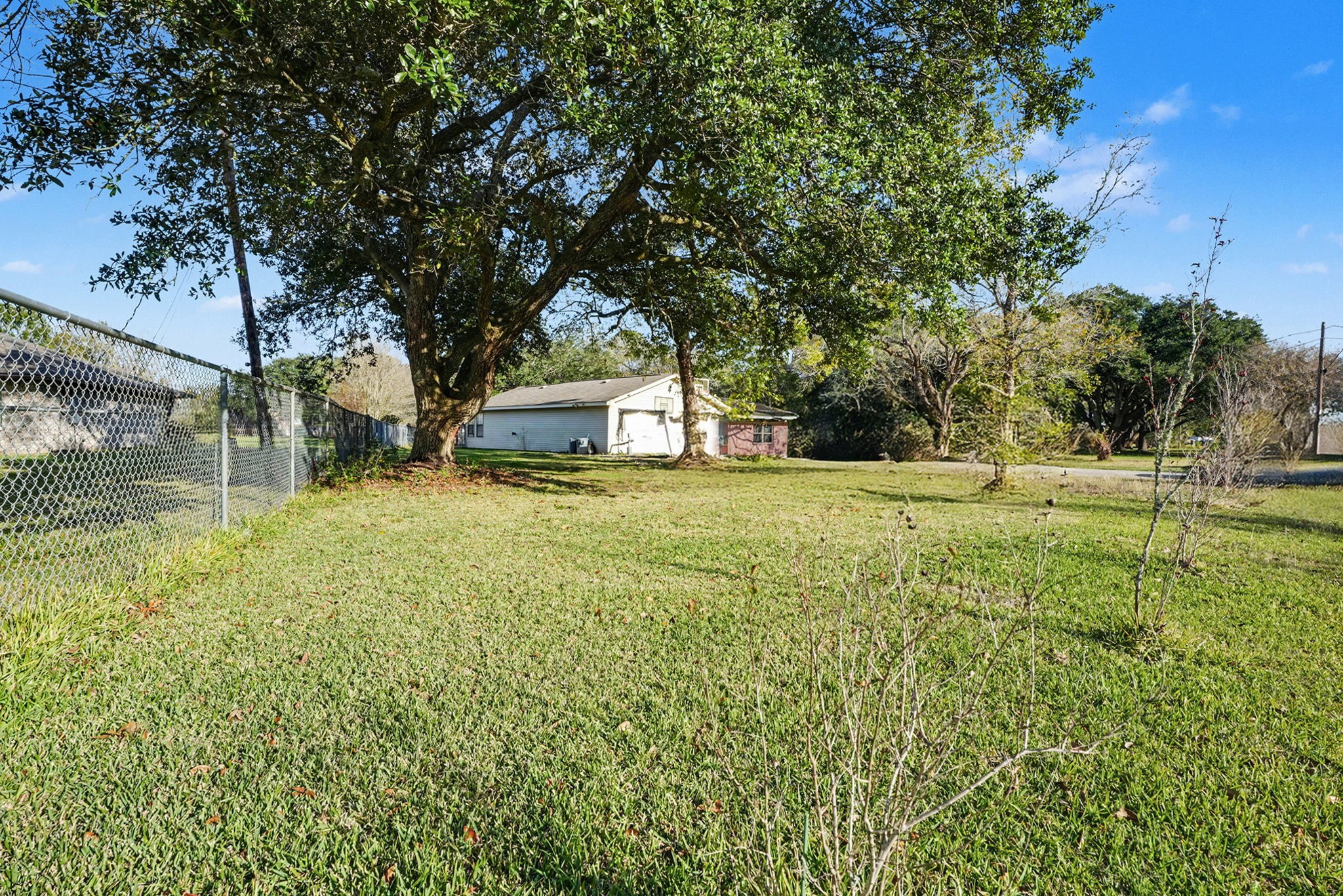 4802 Crosby Cedar Bayou Road Baytown, TX 77521 - Photo 27 of 28 a view of a house with a big yard