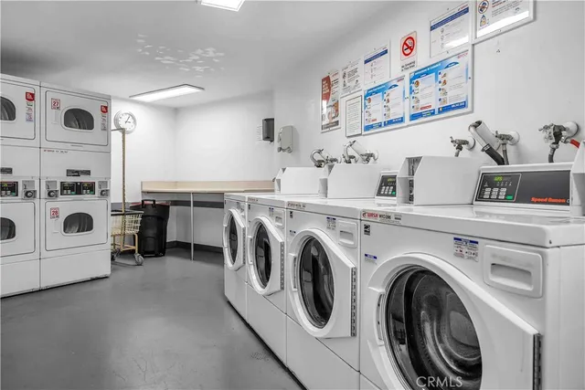 a view of a swimming pool in front of house