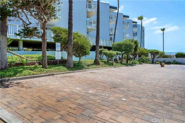 a view of a swimming pool with a lounge chairs