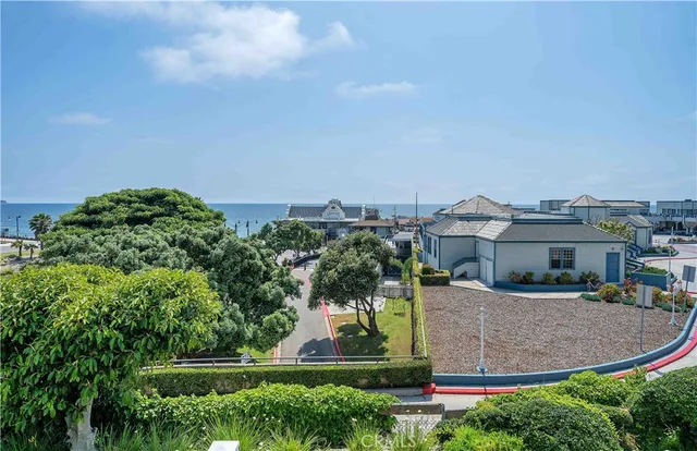 a view of a cars parked in front of a building