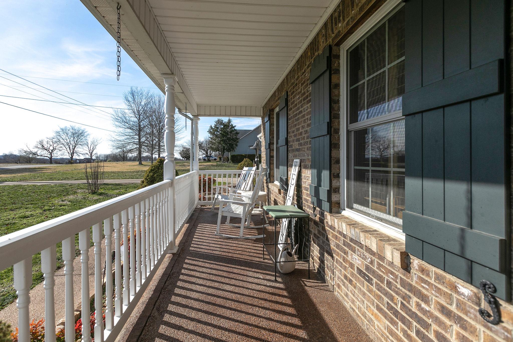 3467 Greens Mill Road Spring Hill, TN 37174 - Photo 5 of 28 a view of balcony with wooden floor and fence