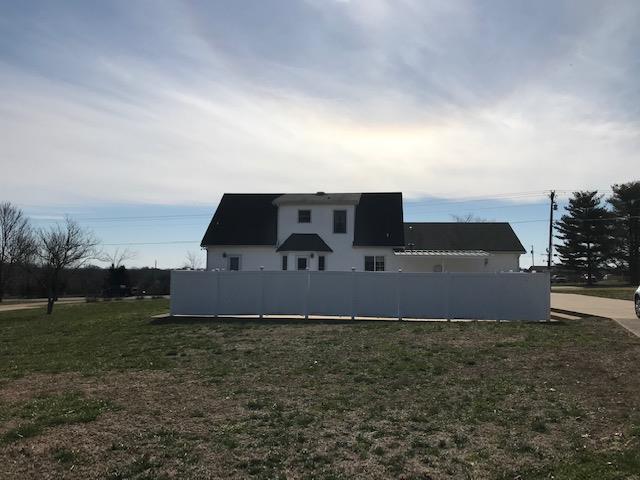 3467 Greens Mill Road Spring Hill, TN 37174 - Photo 6 of 28 a front view of a house with a yard