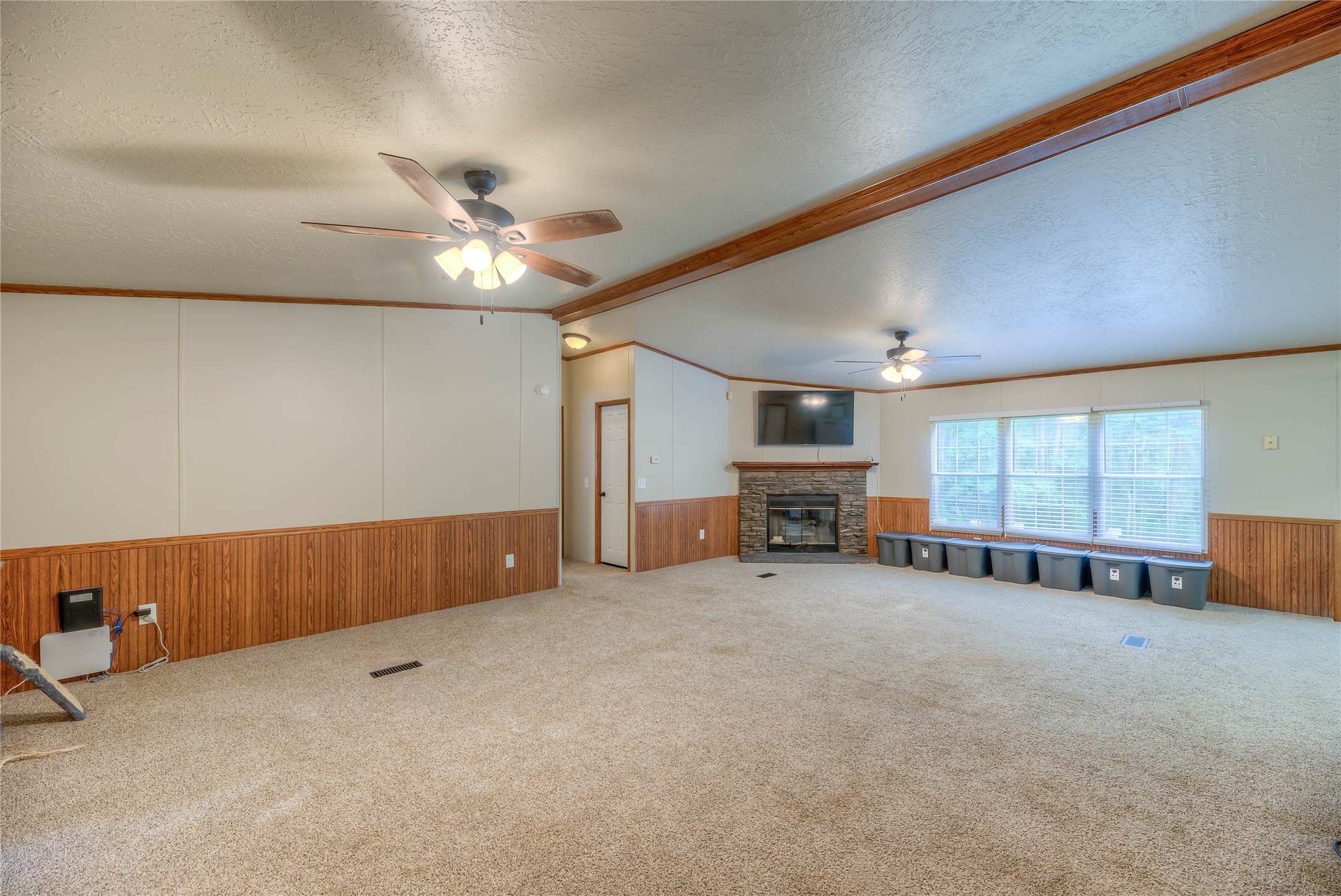 657 Parrish Road Livingston, TX 77351 - Photo 12 of 47 a view of a livingroom with furniture and a ceiling fan