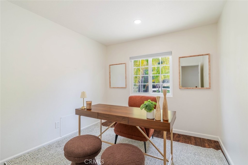 31256 Quail Valley Road Castaic, CA 91384 - Photo 14 of 31 a view of a dining room with furniture and wooden floor