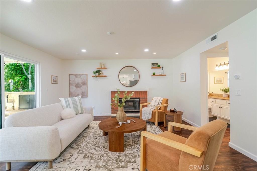 31256 Quail Valley Road Castaic, CA 91384 - Photo 2 of 31 a living room with furniture a window and a clock