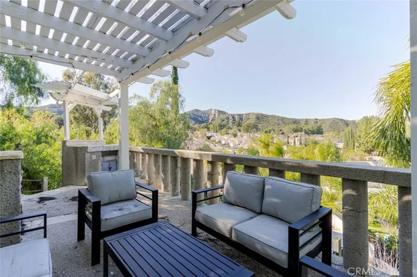 a balcony with furniture