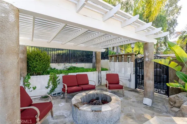 a outdoor living space with furniture and garden view