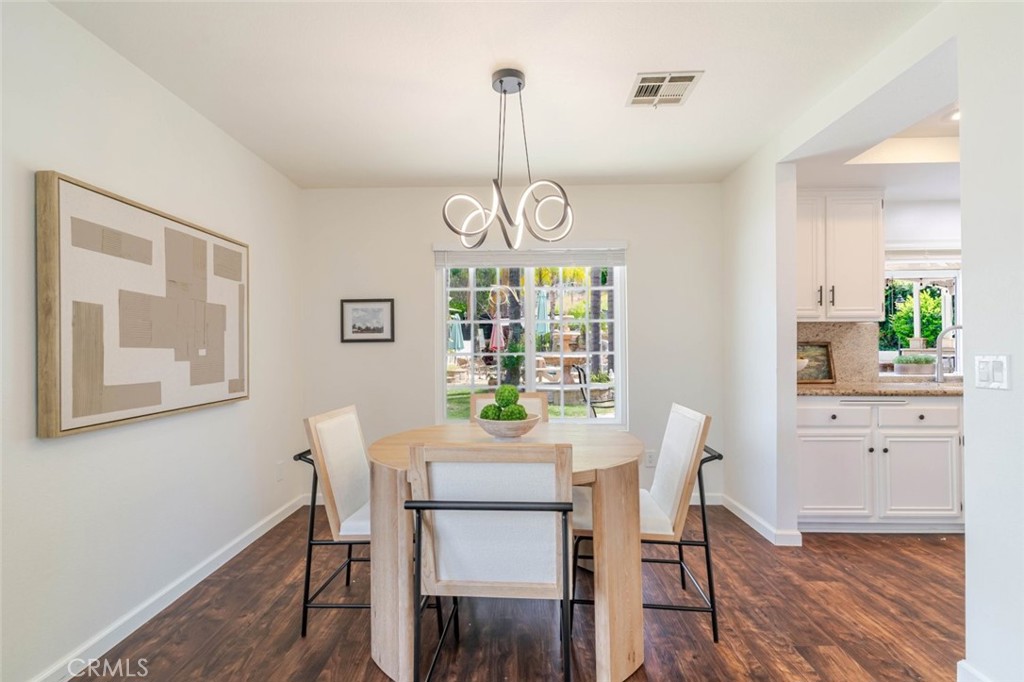 31256 Quail Valley Road Castaic, CA 91384 - Photo 9 of 31 a view of a dining room with furniture window and wooden floor