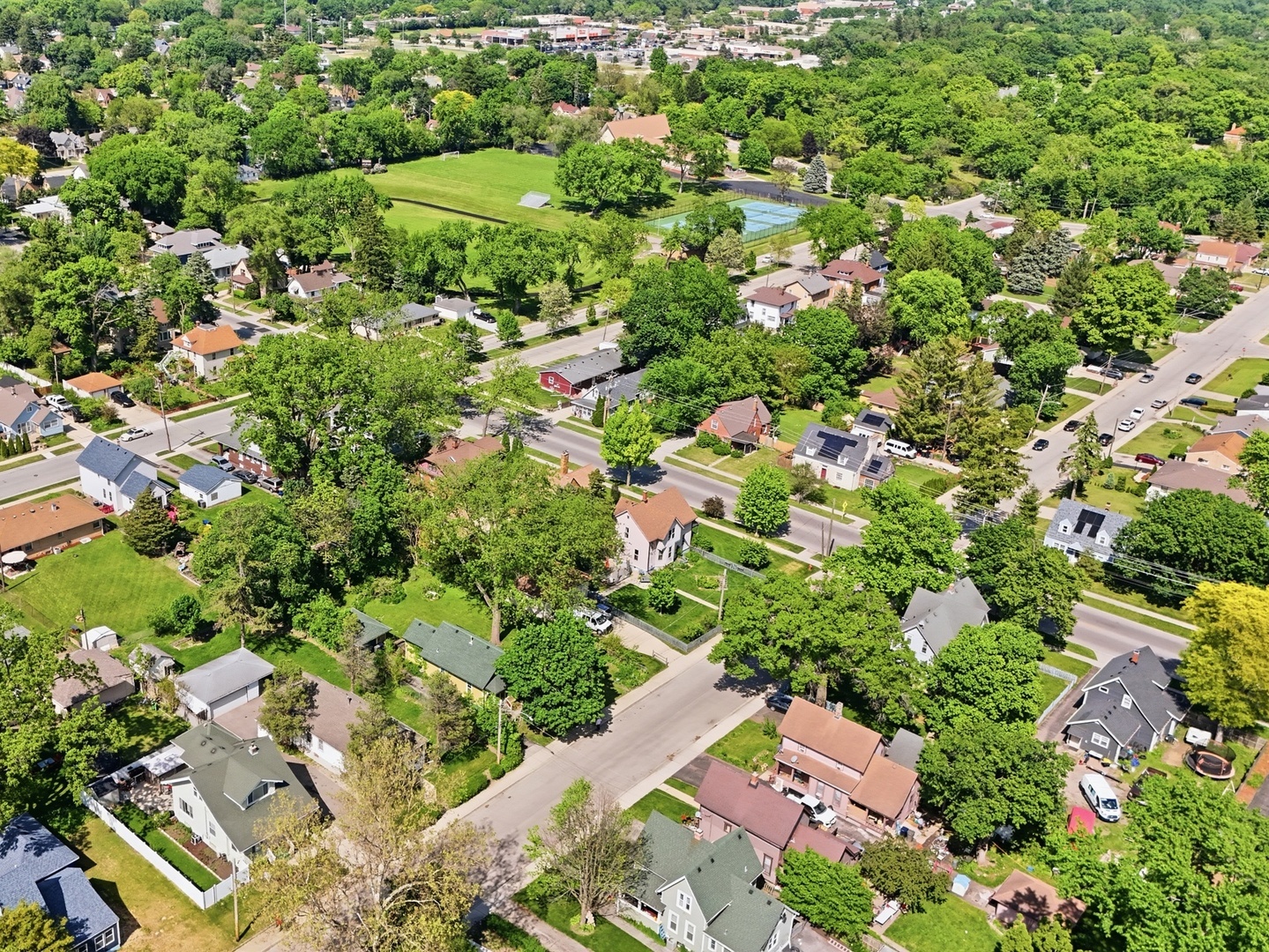 570 Addison Street Elgin, IL 60120 - Photo 17 of 17 an aerial view of residential house with outdoor space and trees all around