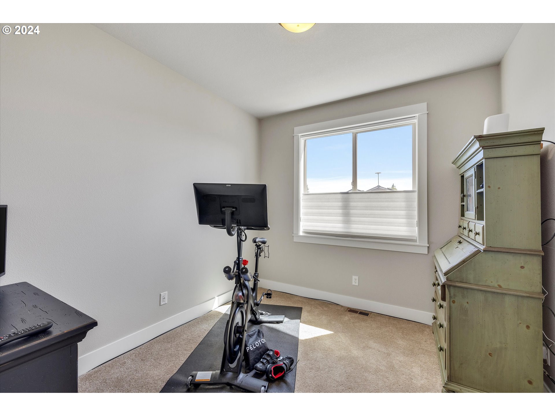 12934 Southwest Buckfield Lane Portland, OR 97224 - Photo 11 of 27 a living room with furniture and a window