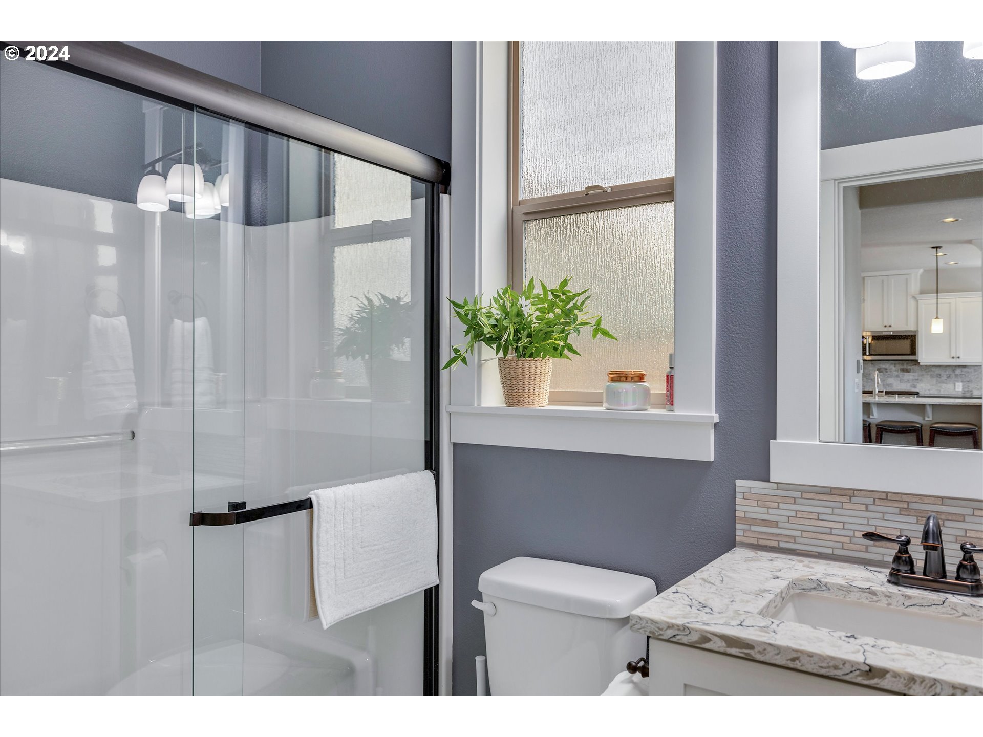 12934 Southwest Buckfield Lane Portland, OR 97224 - Photo 12 of 27 a bathroom with a sink and mirror