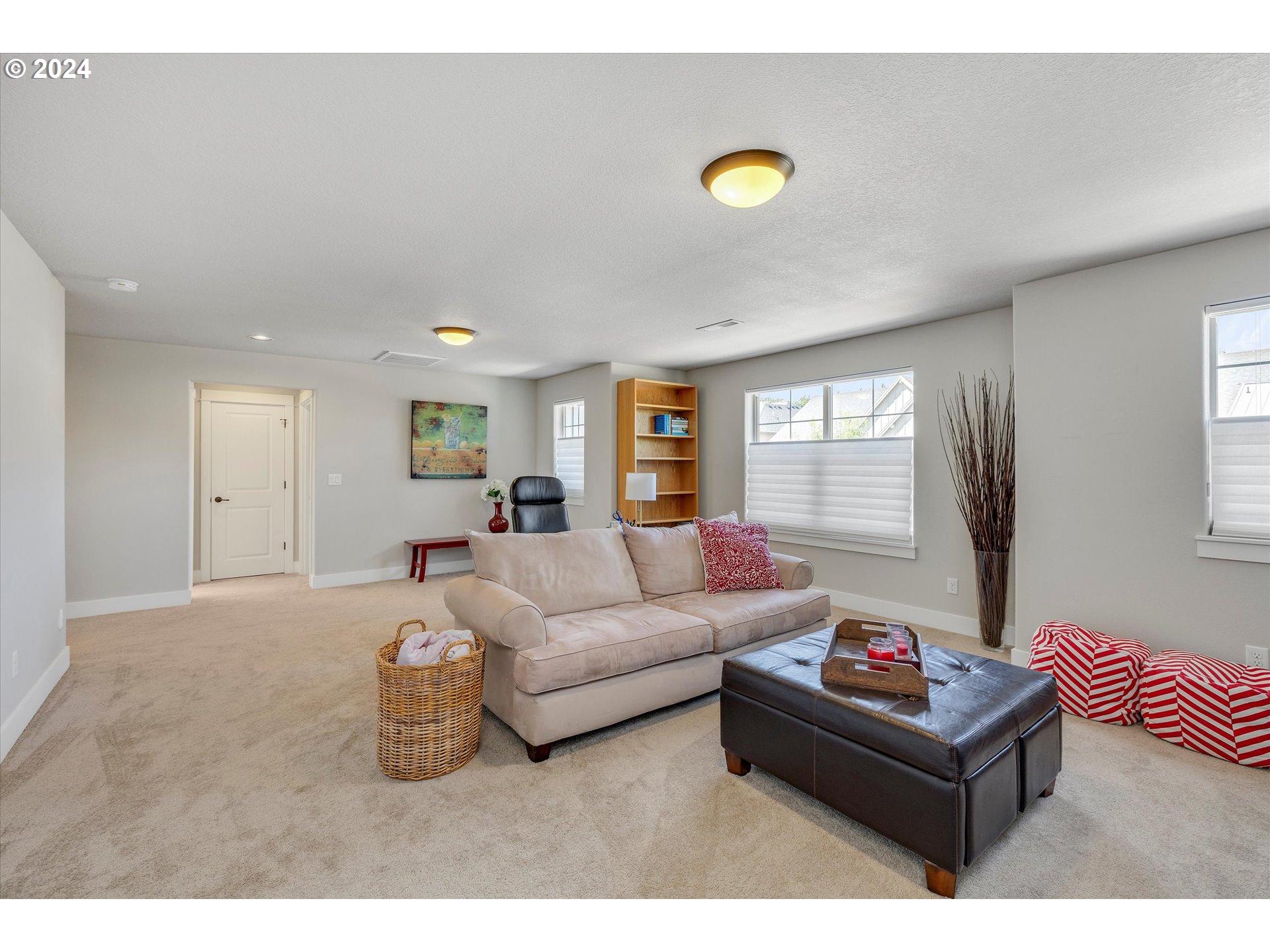 12934 Southwest Buckfield Lane Portland, OR 97224 - Photo 13 of 27 a living room with furniture and a window