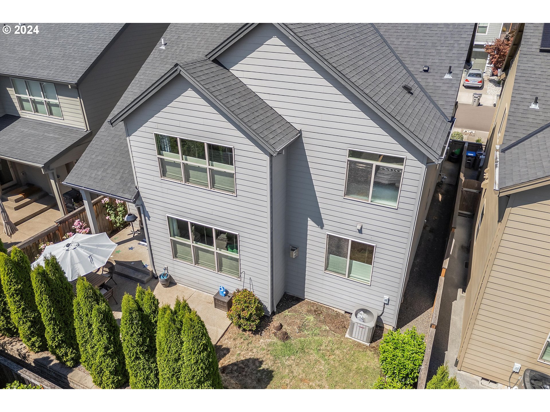 12934 Southwest Buckfield Lane Portland, OR 97224 - Photo 25 of 27 a view of a house with a balcony