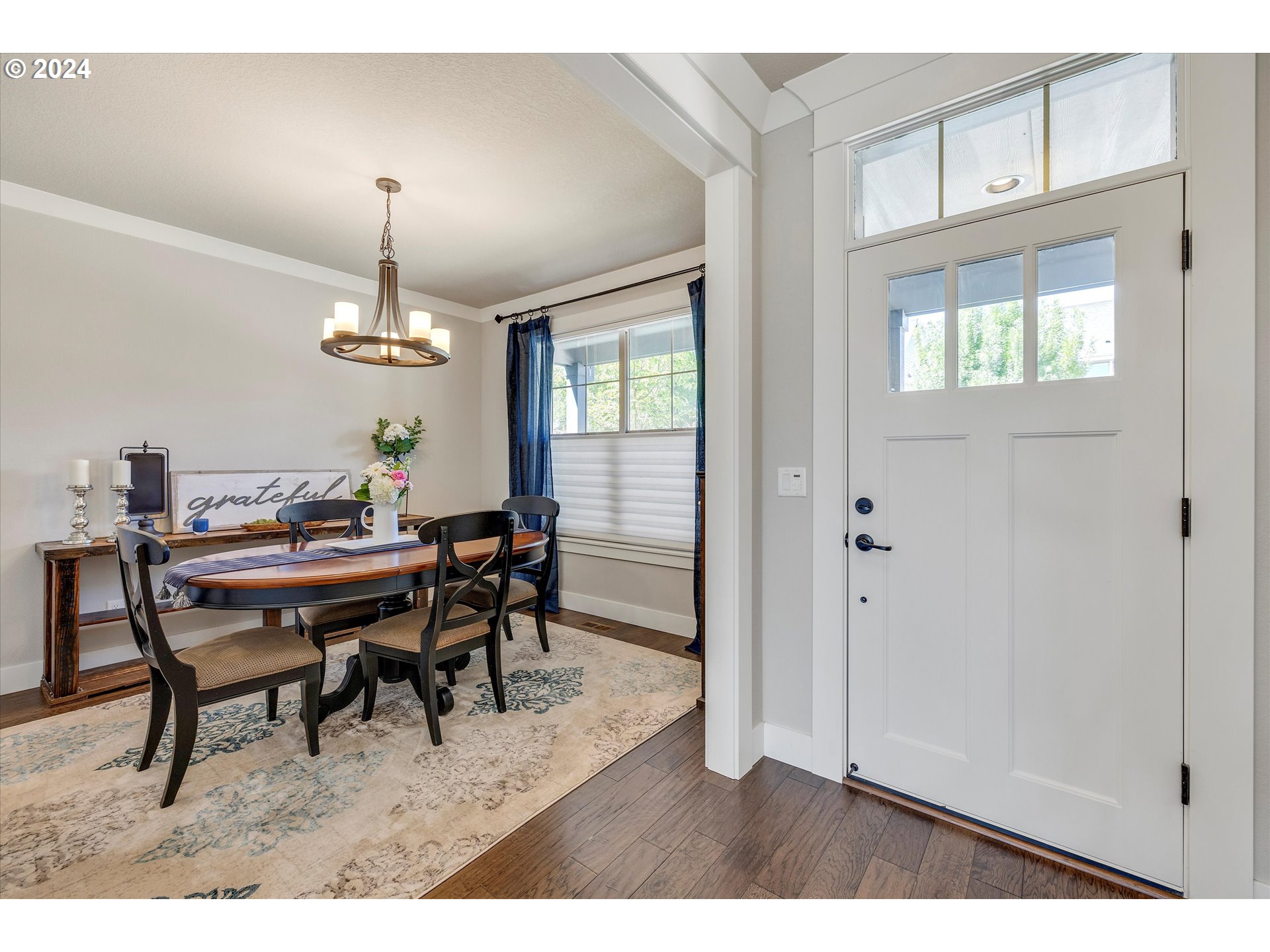 12934 Southwest Buckfield Lane Portland, OR 97224 - Photo 3 of 27 a view of a dining room with furniture