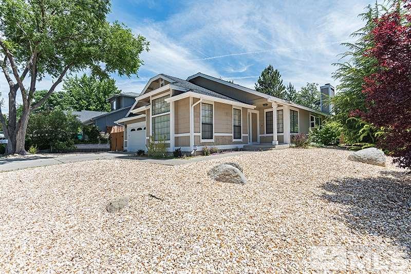 5390 Vista Ridge Way Reno, NV 89523 - Photo 1 of 1 a view of a house with a yard covered in snow