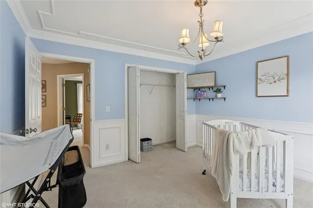 a bathroom with a toilet and a mirror