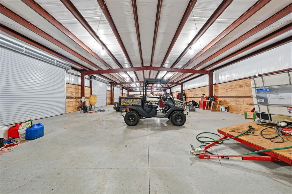 14433 Lake Yale Road Umatilla, FL 32784 - Photo 28 of 38 a view of a room with gym equipment