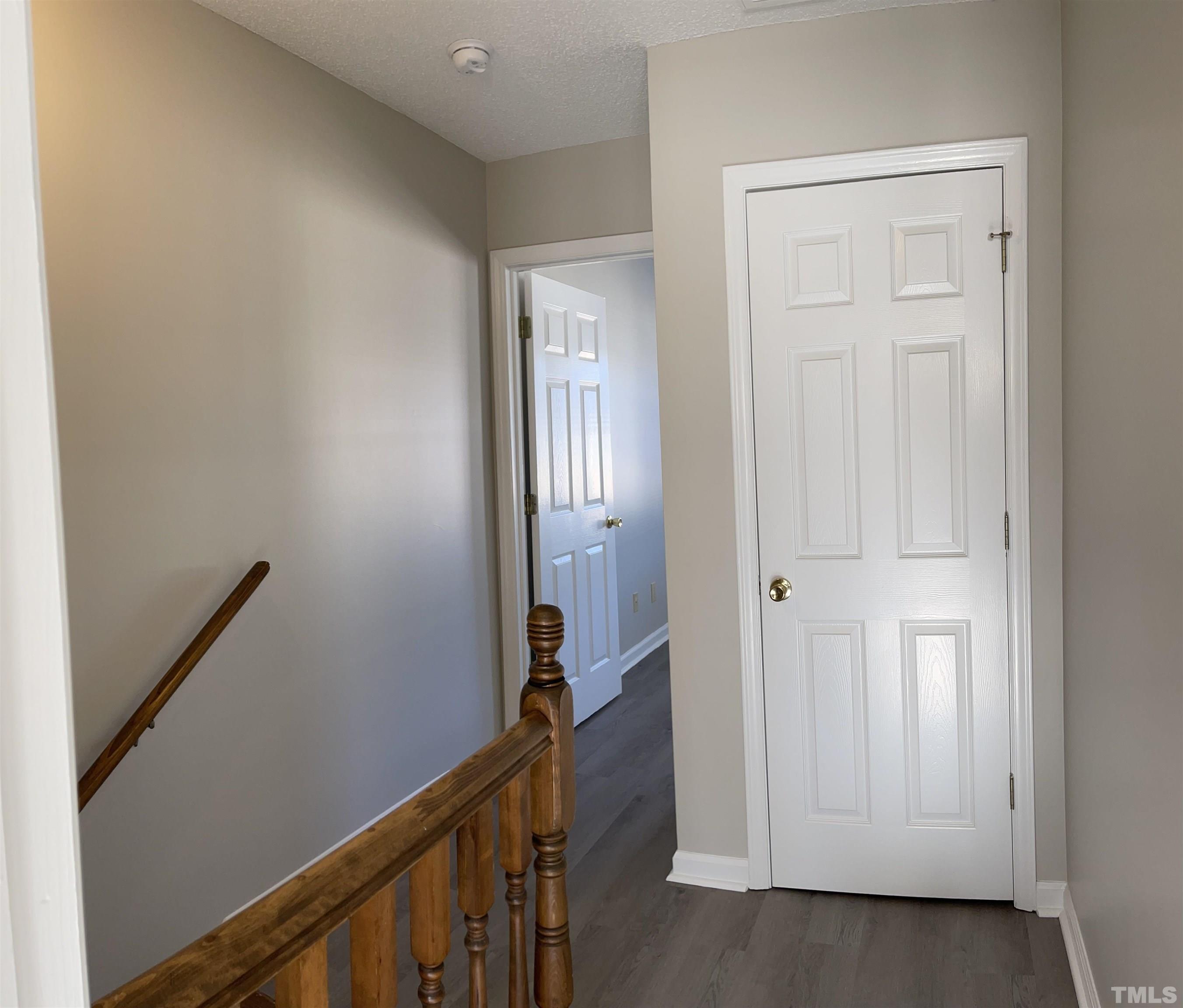 412 South Broad Street East, Unit 46 Angier, NC 27501 - Photo 15 of 16 a view of a hallway with wooden floor and entryway