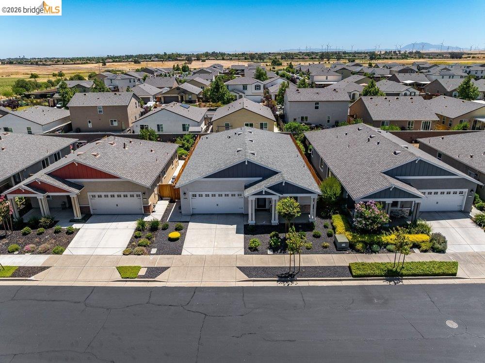 4347 Canada Way Rio Vista, CA 94571 - Photo 35 of 41 Single-story residence featuring a gray shingle roof, light-colored siding, and a dark blue gabled entry