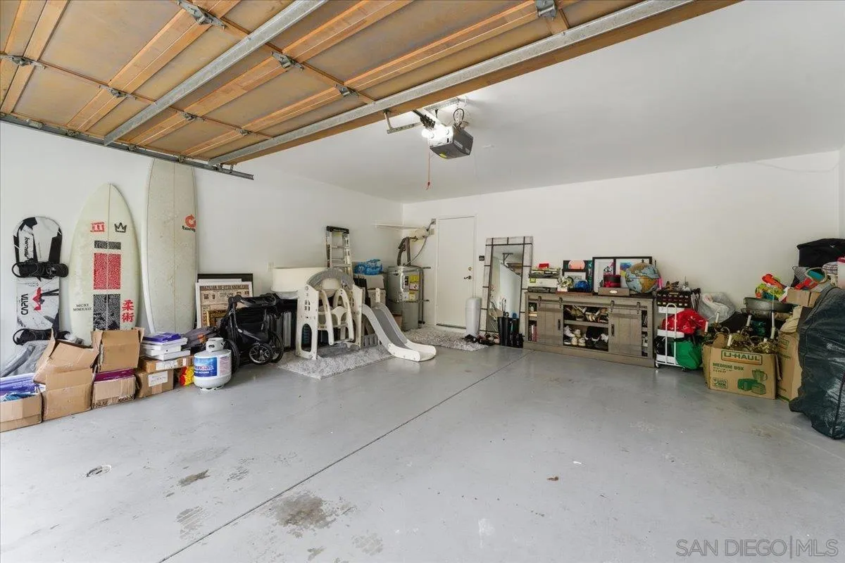29585 Circle R Greens Drive Escondido, CA 92026 - Photo 22 of 40 a view of a garage with rack and bicycle