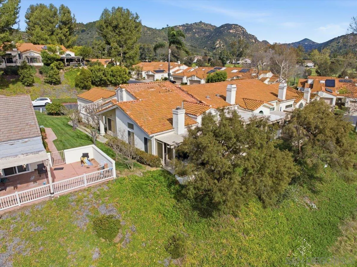 29585 Circle R Greens Drive Escondido, CA 92026 - Photo 36 of 40 an aerial view of residential houses with outdoor space and trees