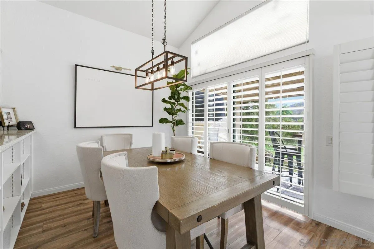 29585 Circle R Greens Drive Escondido, CA 92026 - Photo 9 of 40 a view of a dining room with furniture and wooden floor