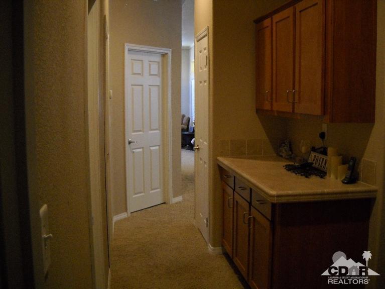 38881 Parker Ridge Way Palm Desert, CA 92260 - Photo 5 of 7 a bathroom with a sink and cabinets