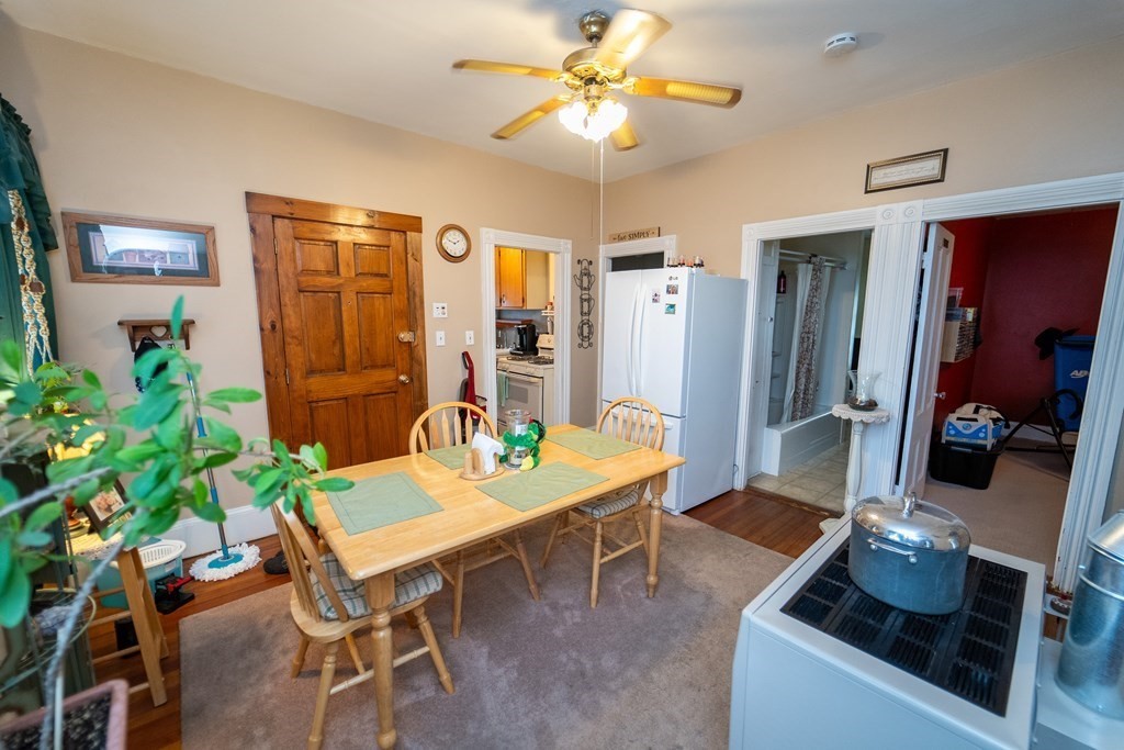 403 America Street Fall River, MA 02721 - Photo 4 of 14 a view of a dining room with furniture and chandelier