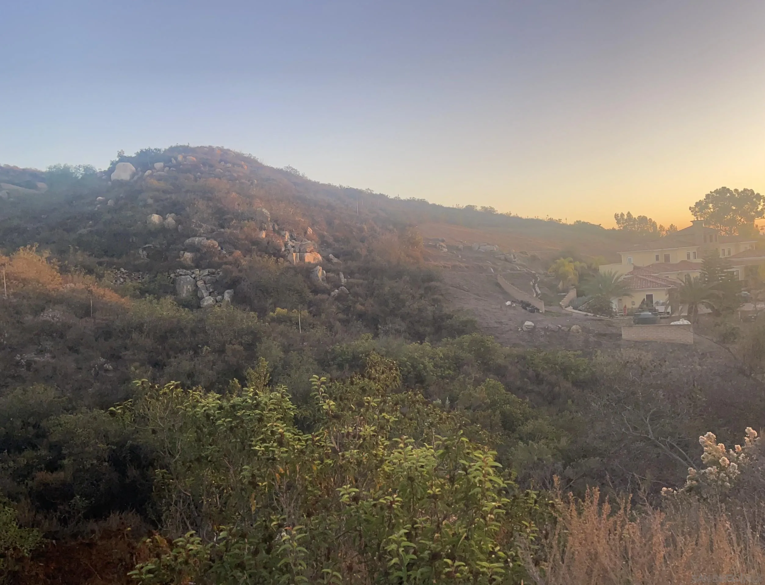 Orchard View Drive Poway, CA 92064 - Photo 8 of 9 a view of a dry yard with mountains in the background