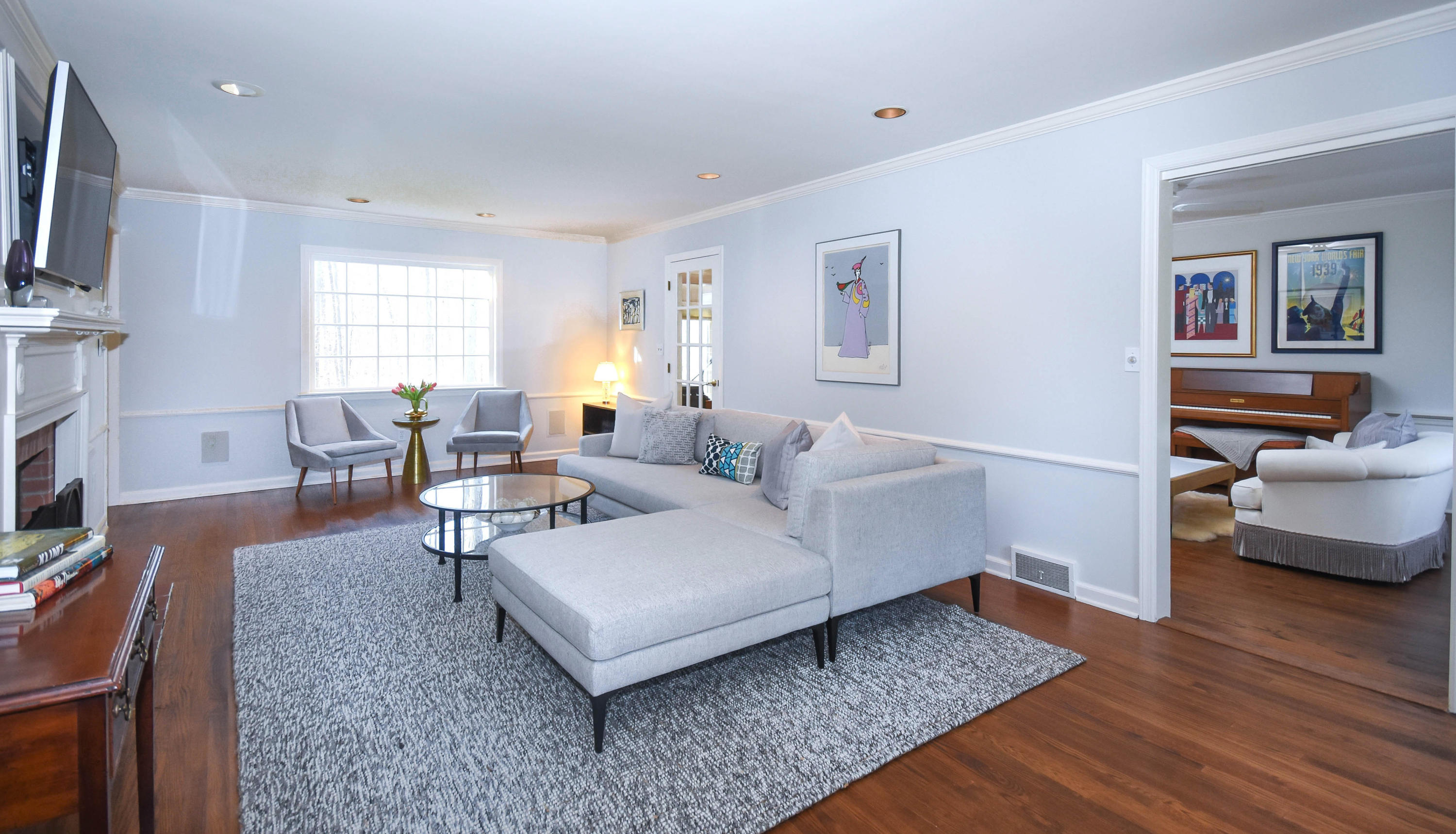 45 Silver Ridge Road New Canaan, CT 06840 - Photo 3 of 24 a living room with furniture and a flat screen tv