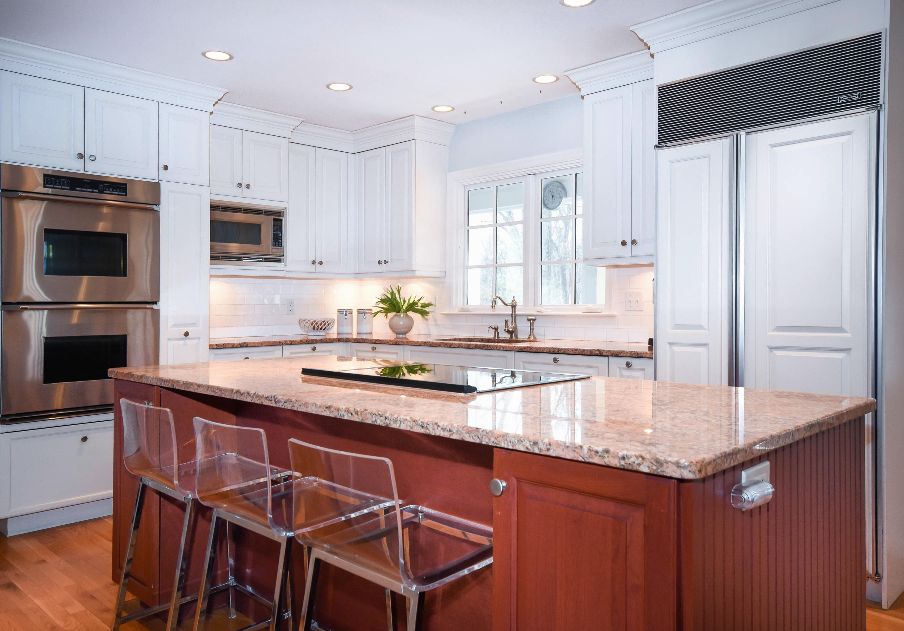 45 Silver Ridge Road New Canaan, CT 06840 - Photo 6 of 24 a kitchen with kitchen island granite countertop a sink and stainless steel appliances