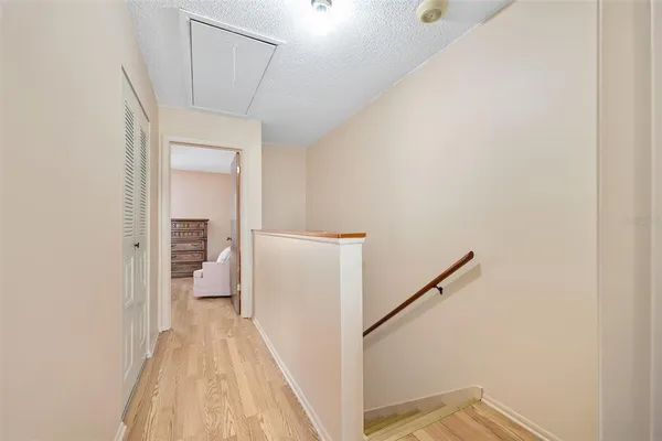 a view of a bedroom from a hallway