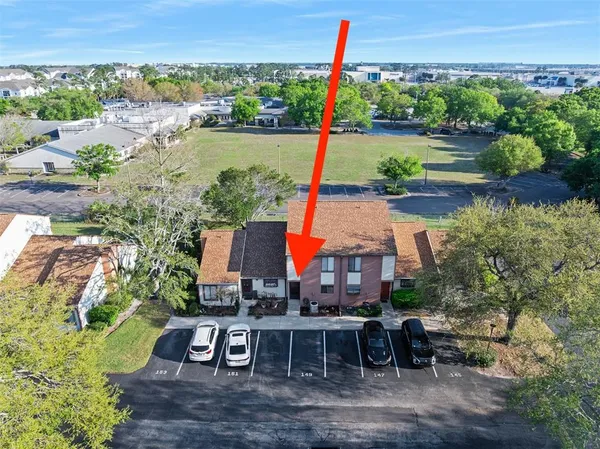 a view of a garden with a lake view