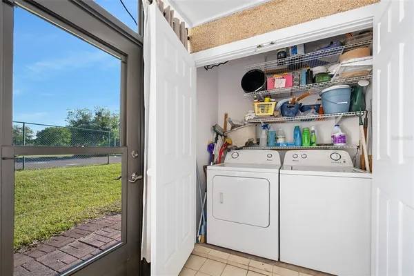 a utility room with dryer and washer