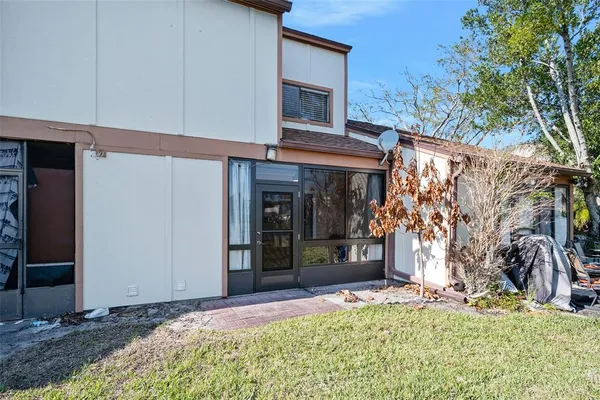 a view of a house with snow on the wall