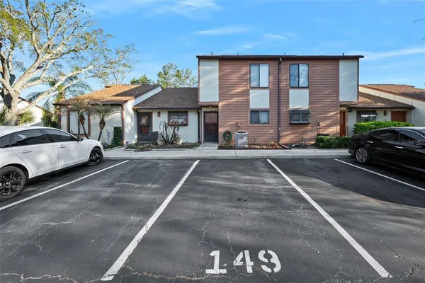 a view of a car park in front of a building