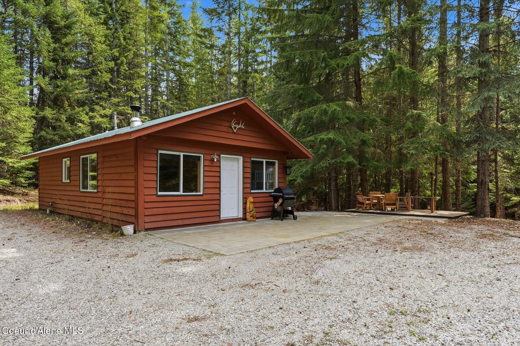 354 Fall Creek Road Naples, ID 83847 - Photo 1 of 37 Front of Cabin
