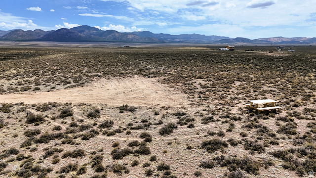 123 East Tbd 5000 Road North Panguitch, UT 84759 - Photo 16 of 54 Expansive desert landscape featuring natural scrub brush and distant mountain ranges