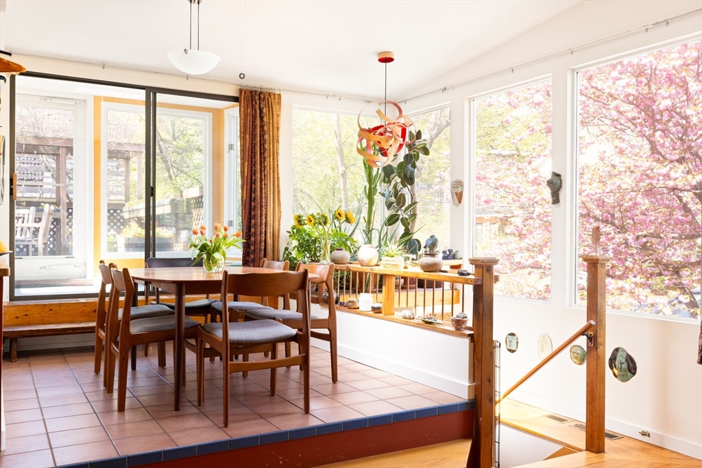 135 Langley Road, Unit 135 Newton, MA 02459 - Photo 4 of 20 a dining room with furniture and window