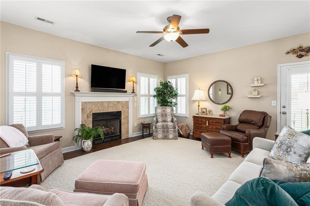 2141 Longshadow Drive Graham, NC 27253 - Photo 12 of 41 Another view of the living room. Notice the plantation shutters