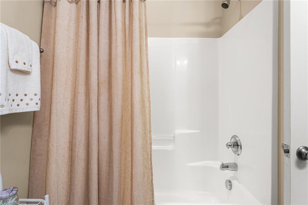 2141 Longshadow Drive Graham, NC 27253 - Photo 23 of 41 Hall bath tub/shower
