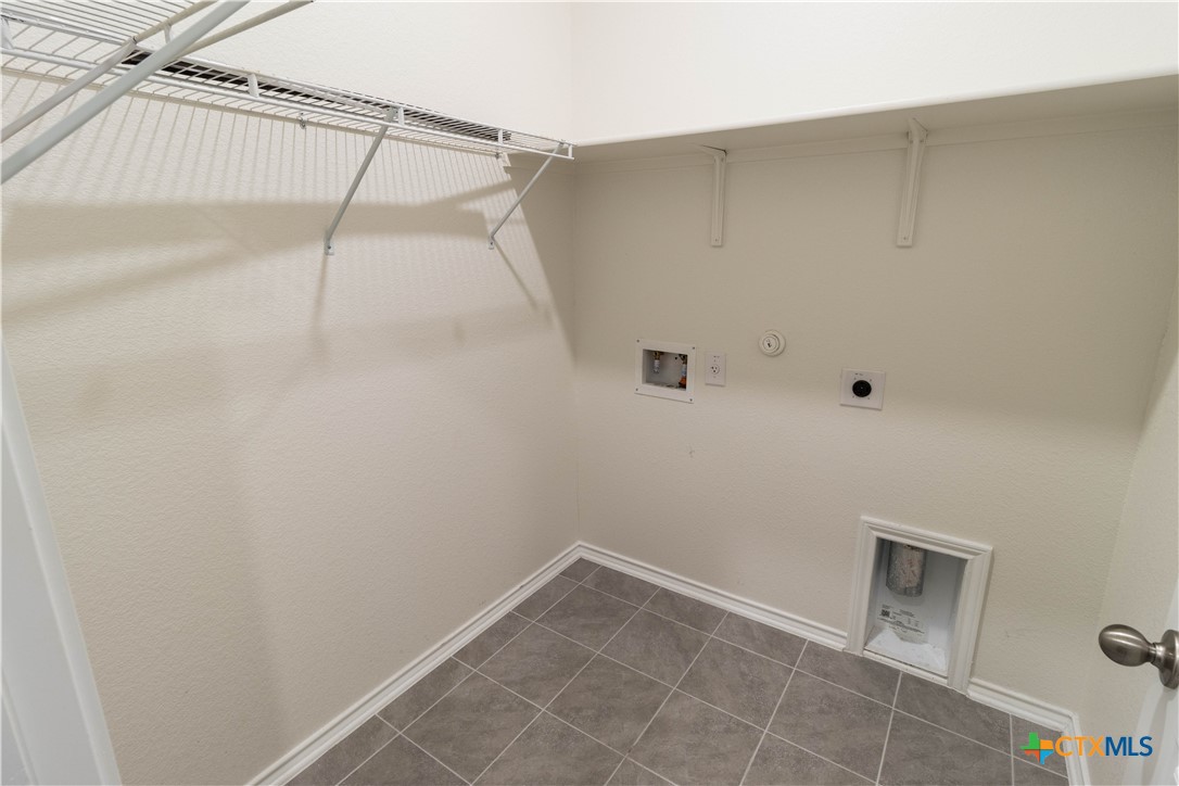 211 Summit Drive Lockhart, TX 78644 - Photo 19 of 33 a view of an empty walk in closet