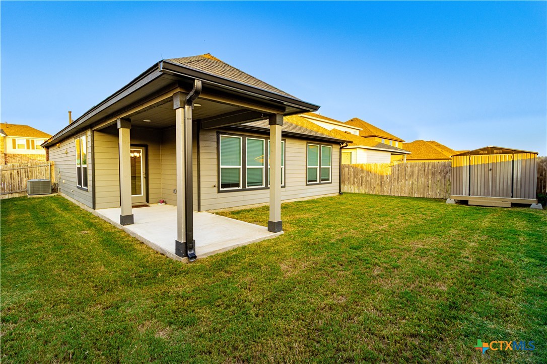 211 Summit Drive Lockhart, TX 78644 - Photo 26 of 33 a view of a house with backyard and porch
