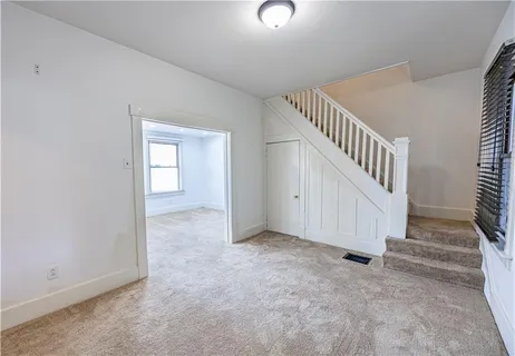 a view of an entryway with staircase