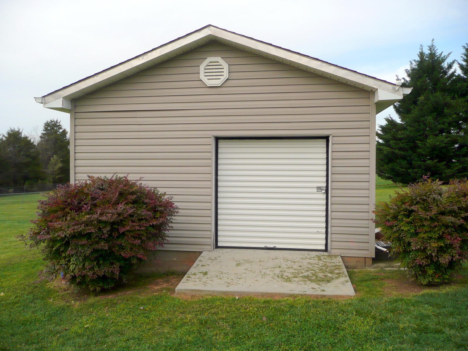 691 Oak Grove Road Madisonville, TN 37354 - Photo 7 of 31 Garage Door in Cottage