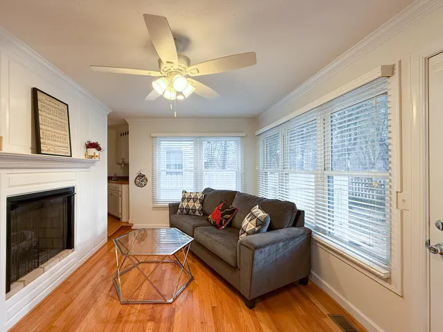 a bathroom with a bathtub and window