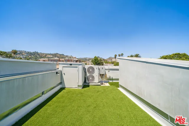a view of a ocean from a balcony