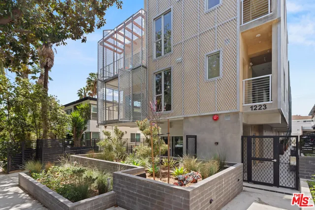 a view of outdoor sitting area with furniture